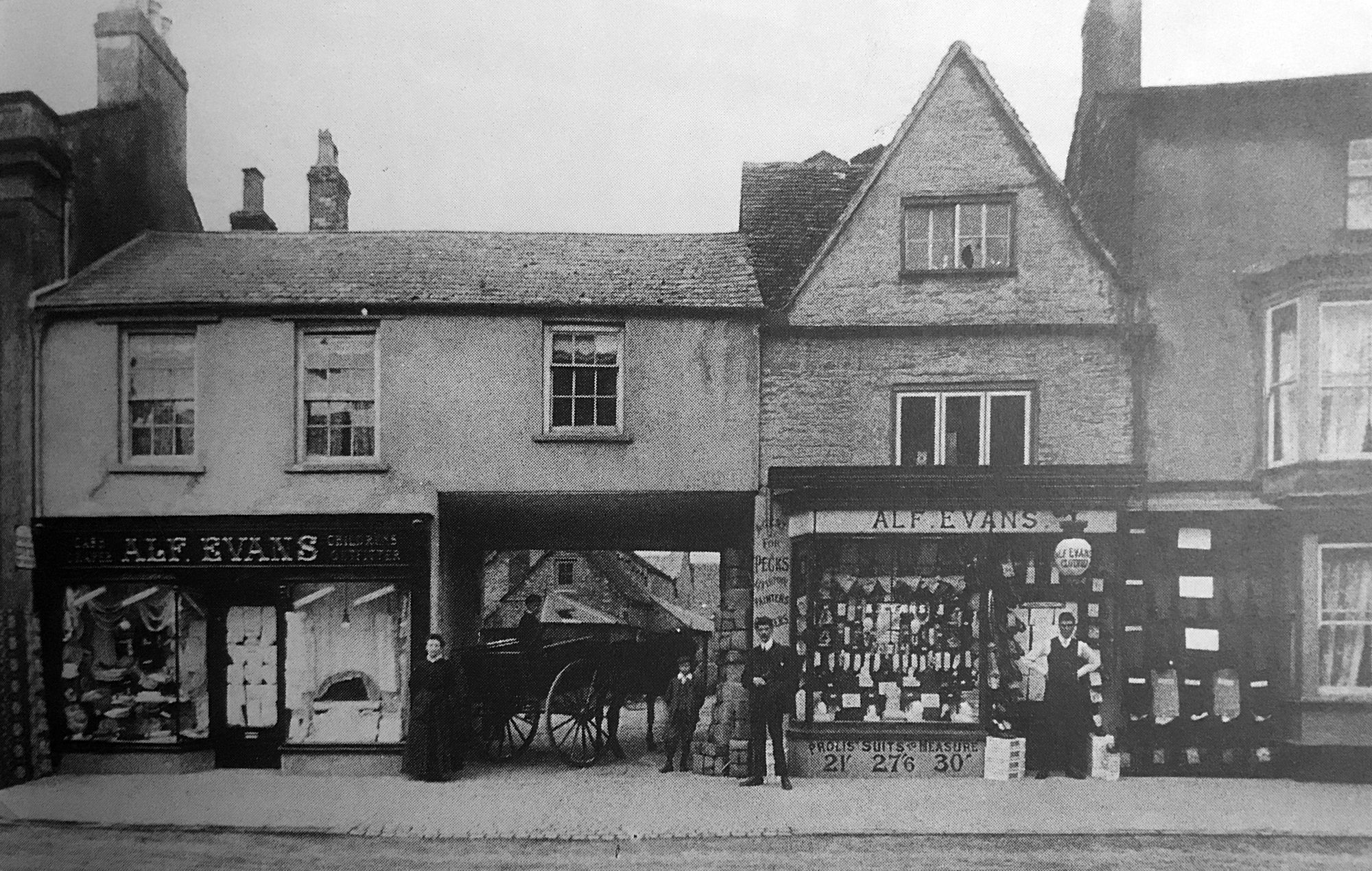 The two shops either side of Evans Yard, 1910s.